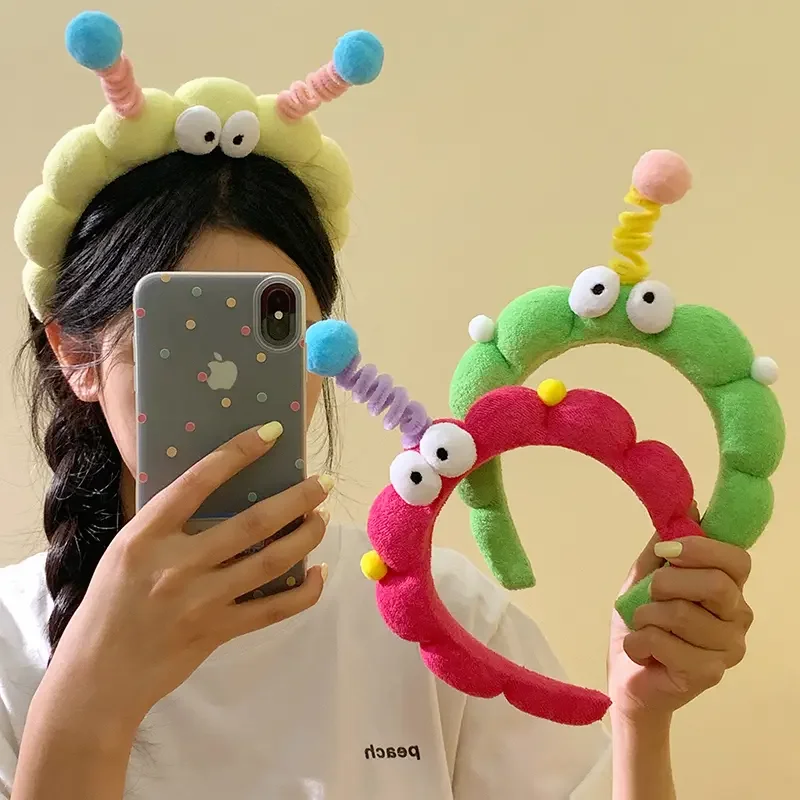 Cat ear headband with bell - side view